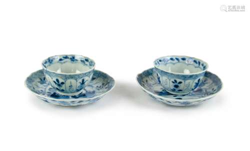 PAIR OF BLUE AND WHITE TEA CUPS AND DISHES