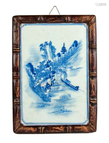 A CHINESE FRAMED BLUE AND WHITE PORCELAIN PLAQUE