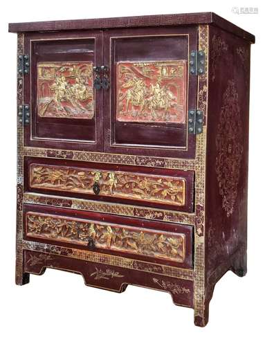 A WOOD CARVED GILT CABINET