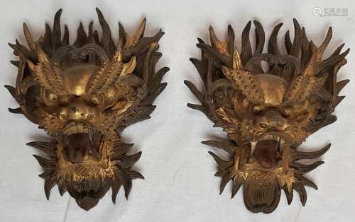 PAIR OF CARVED GILDED WOOD DRAGON HEADS