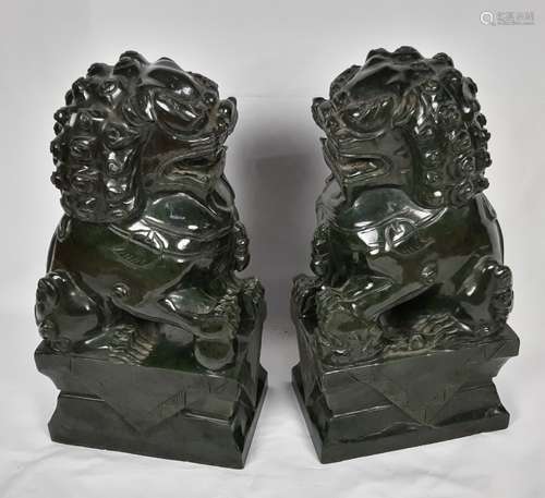 PAIR OF DRK GREEN JADE CARVED FOO LIONS