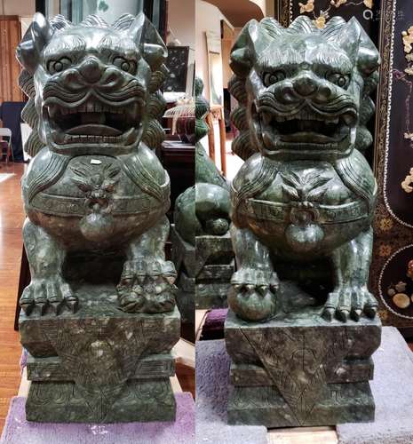 A PAIR OF JADE CARVED GUARDIAN LIONS