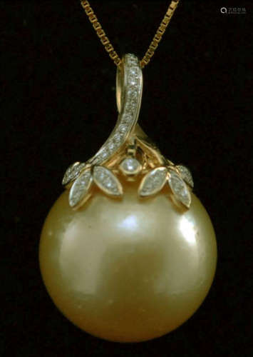 A LARGE PEARL ON A FLOWER SHAPE 18K GOLD RING