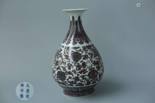 A UNDERGLAZE-RED PORCELAIN VASE WITH QIANLONG MARKING