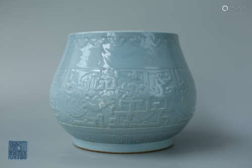 A BLUE-GLAZED PORCELAIN VASE WITH BEAST PATTERNS AND QIANLONG MARKING