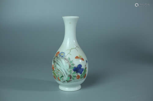 A FAMILLE ROSE GUANYIN VASE