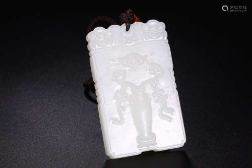 A HETIAN JADE PENDANT WITH STORY PATTERN