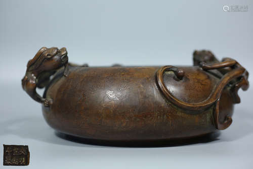 A BRONZE EAR CENSER WITH DRAGON SHAPE HANDLES