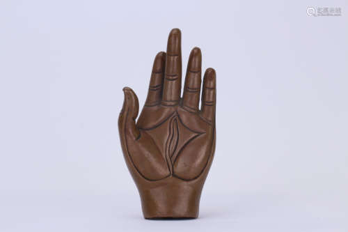 A Chinese Bronze Buddha Hand