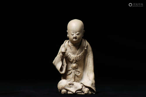 A Chinese Hutian Porcelain Boy