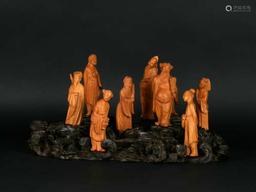 A Set of Eight Chinese Carved Huangyang Figures