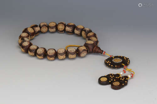 A Chinese Carved Agarwood Prayers Beads