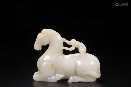 A HETIAN JADE ORNAMENT IN HORSE SHAPE