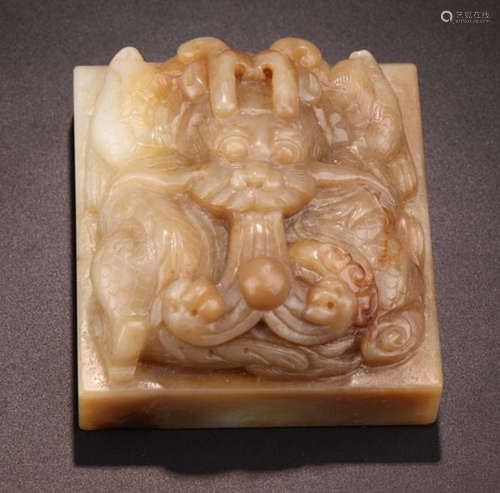 A HETIAN JADE DRAGON SHAPED SEAL