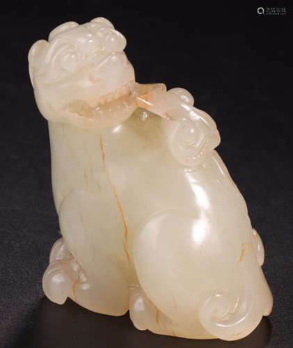 A HETIAN JADE BEAST SHAPED ORNAMENT