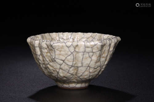 A GE KILN CUP OF DIAMOND SHAPED