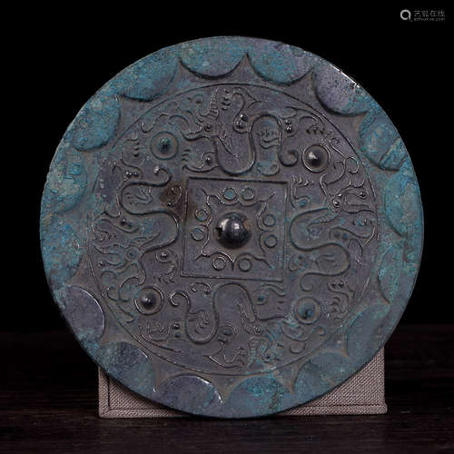 A BRONZE MIRROR