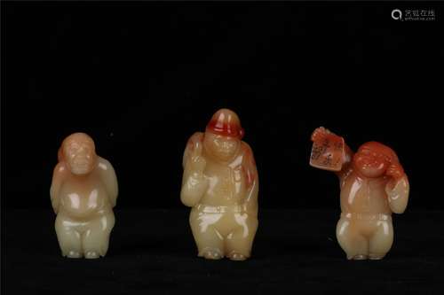 A GROUP OF THREE SOAPSTONE STANDING FIGURES, QING