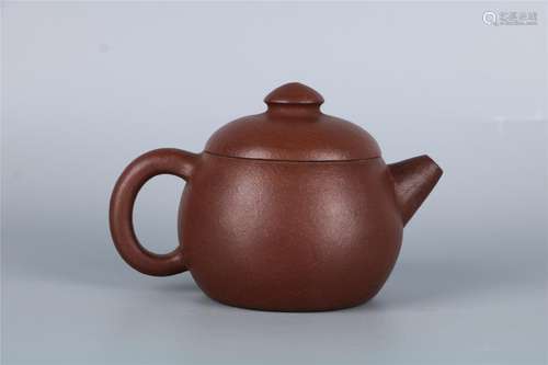 A CHINESE YIXING TEAPOT BY â€˜ZHOU WEN CAIâ€™, EARLY