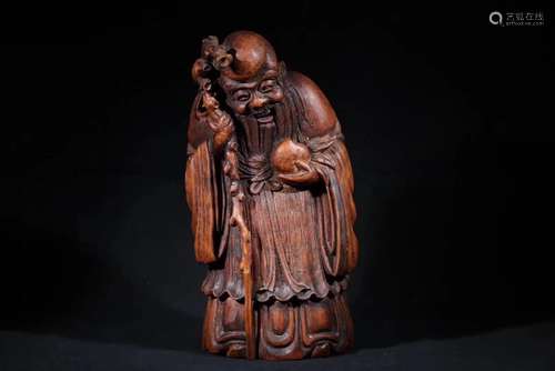 A CHINESE LONGEVITY GOD BAMBOO STATUE, EARLY QING