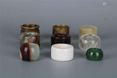 A GROUP OF NINE CHINESE THUMB-RINGS, QING DYNASTY