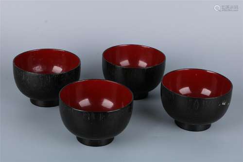 A GROUP OF FOUR LACQUERED WOOD BOWLS, QING DYNASTY