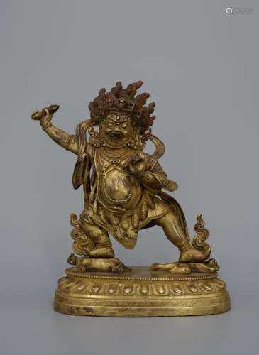 A CHINESE GILT BRONE JAMBHALA STATUE, QING DYNASTY