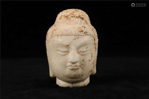 A CHINESE WHITE JADE BUDDHA HEAD, TANG DYNASTY