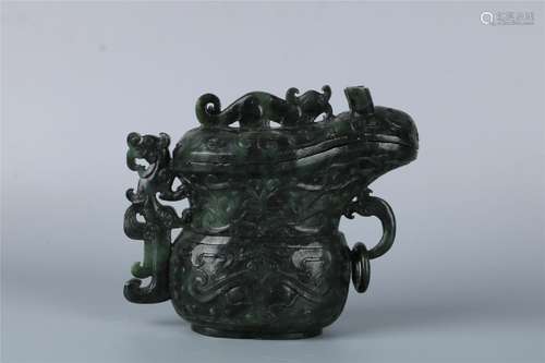 A CHINESE GREEN JADE VESSEL SEAL QIANLONG SIX-CHARACTER