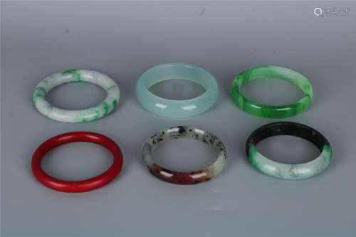 A GROUP OF SIX CHINSESJADE BRACELETS, QING DYNASTY