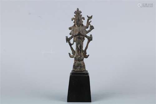 A CHINESE BRONZE GUANYIN STATUE WITH FITTED STAND, FIVE