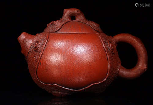 A ZISHA TEAPOT WITH TREE PATTERN BODY