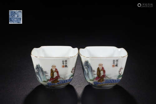 PAIR OF QIANLONG MARK FAMILLE ROSE CUPS