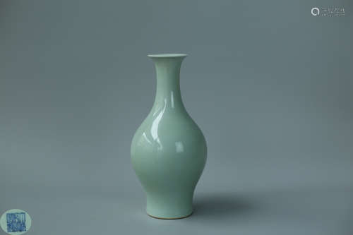 A CYAN-BLUE GLAZED VASE