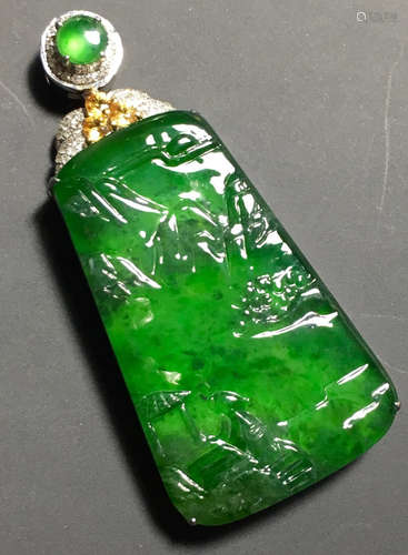 A GREEN JADEITE CARVED LANDSCAPE PENDANT, TYPE A