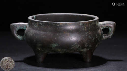 A BRONZE CASTED DOUBLE EAR TRIPOD CENSER