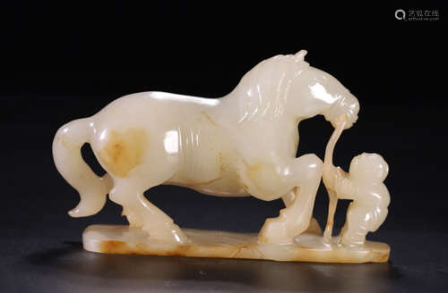 A HETIAN JADE CARVED HORSE SHAPED PENDANT