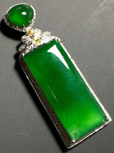 A GREEN JADEITE CARVED PINGAN PENDANT, TYPE A