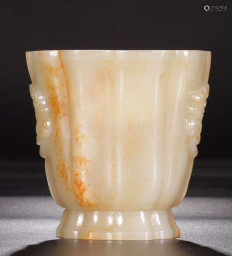 A HETIAN JADE CARVED BEAST PATTERN CUP