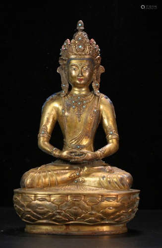 A TIBETAN GILT BRONZE CASTED LIFELESS BUDDHA