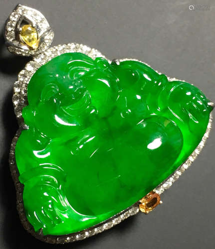 A GREEN JADEITE CARVED BUDDHA PENDANT, TYPE A