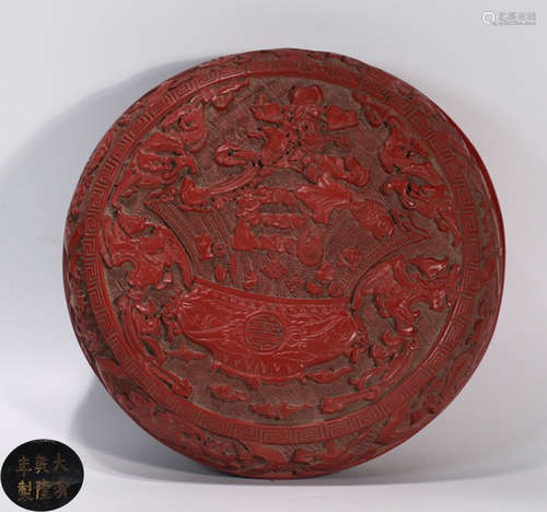 A RED LACQUER CARVED FLOWER PATTERN BOX