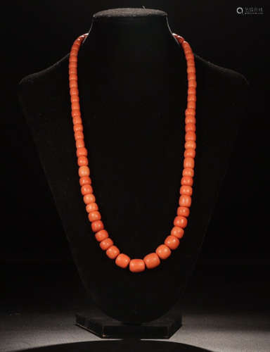 A RED CORAL BEADS STRING NECKLACE