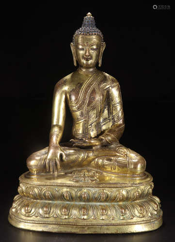 A GILT BRONZE CASTED SAKYAMUNI BUDDHA