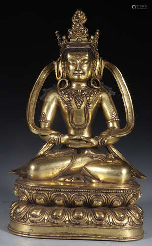 A GILT BRONZE LIFELESS BUDDHA