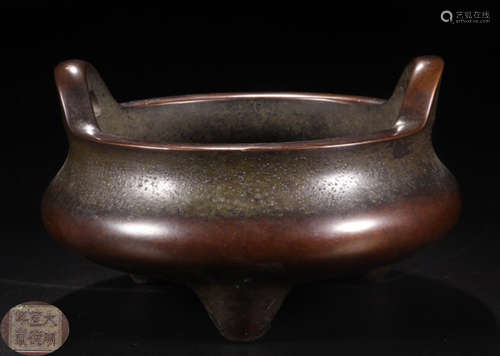 A BRONZE CASTED DOUBLE EAR TRIPOD CENSER