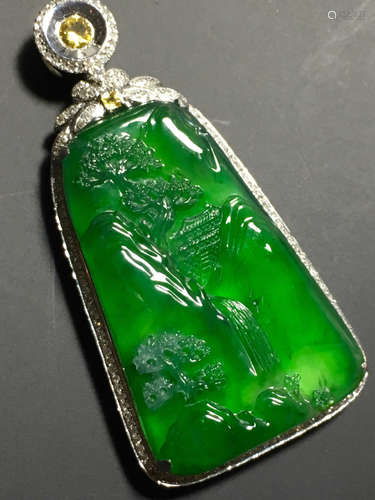 A GREEN JADEITE CARVED LANDSCAPE PENDANT, TYPE A