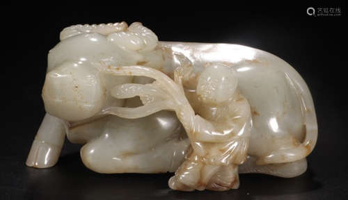 A HETIAN JADE CARVED CHILD&COW SHAPED PENDANT