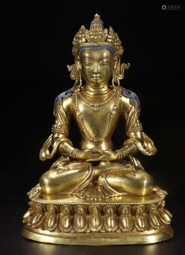 A TIBETAN OLD GILT BRONZE BUDDHA