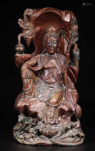 A RED WOOD CARVED GUANYIN BUDDHA